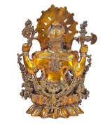 Brass Ganesha idol back view with round halo and ornate detailing