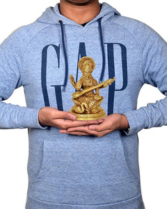 Brass Saraswati statue in hands, 5 inch height, veena figure