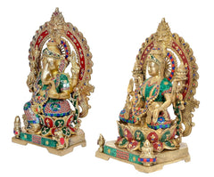 Brass Lakshmi and Ganesh idols in angled front views, colorful jewel borders and crowns