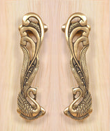 Peacock brass door handle pair, detailed leaf and bird motifs on two handles