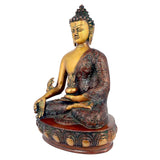 Seated Buddha sculpture with brass gold finish, detailed robe and decorative base