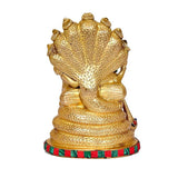 Brass Sheshnag base view of Vishnu-Lakshmi figurine with striped green-red platform