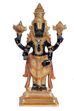 Front view of brass Balaji idol, black face, gold crown, jeweled sash and base