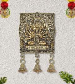 Bronze Hanuman wall idol panel with ornate arches and three bell charms hanging below