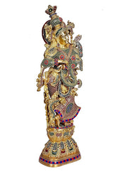 Brass Radha Rani sculpture front view with holding pose and gold-toned ornaments