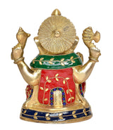Rear view of brass Ganesha idol with colorful back panel and blue base border