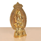 Gold metal Ganesha idol, angled view, intricate carvings on the base