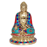 Seated Buddha figurine, front view, brass face and jeweled multicolor clothing