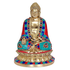 Seated Buddha figurine, front view, brass face and jeweled multicolor clothing
