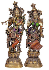 Brass Radha Krishna sculpture pair, full-view with green accents and ornate jewelry, 29 in