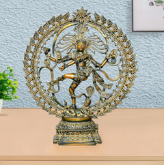 Brass Natraj Lord Shiva dancing idol with ornate circular halo and raised arms