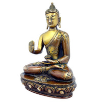 Messing-Buddha-Statue sitzend, Seitenansicht, ruhiges Gesicht, erhobene Hand