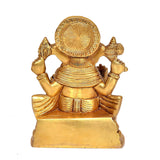 Brass Ganesh idol statue, back view with detailed circular halo and drape
