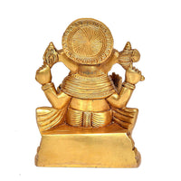 Brass Ganesh idol statue, back view with detailed circular halo and drape