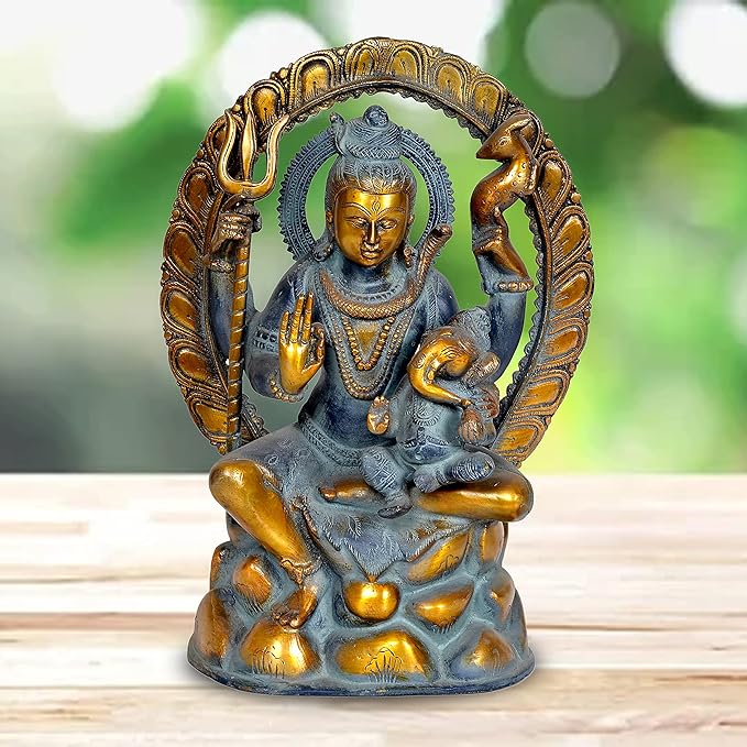 Sitting Shiva deity idol figurine with Ganesha, blue skin, gold details, ornate halo
