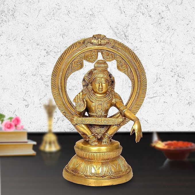 Seated Lord Ayyappan brass statue with carved arch frame and Kirtimukha, gold