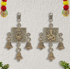Brass Lakshmi-Ganesh wall hanging with bell charms and engraved center panel