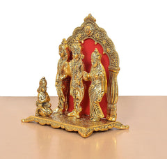 Ram Darbar statue side view: three standing figures with small seated figure at base