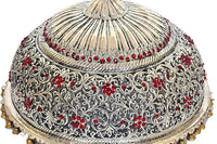 Brass deity Chattar underside: circular white relief dome with gold bell trim