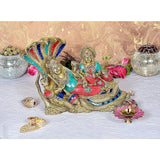 Brass Vishnu-Lakshmi idol sitting on Shesh nag, blue red turquoise detailing