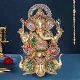 Brass Ganpati statue, 17-inch seated four-armed figure with painted multicolor details