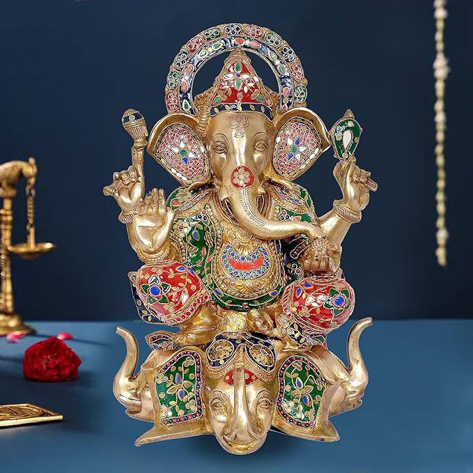 Brass Ganpati statue, 17-inch seated four-armed figure with painted multicolor details