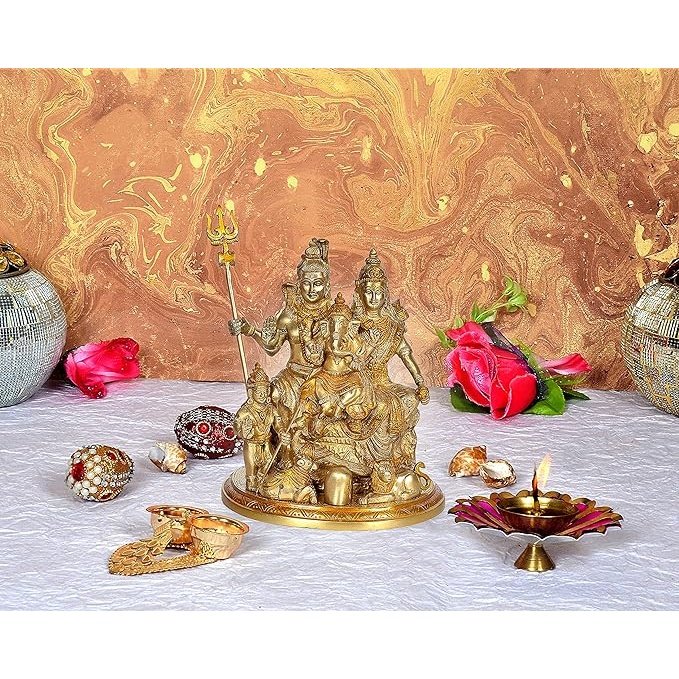 Brass Shiv Parivar family idol (10 in), seated figures with trident
