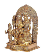 Brass Shiv Parivar idol, side view: seated Shiva family with standing attendants