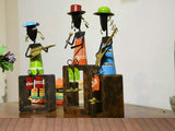 Three metal cap musicians with instruments on rectangular bases, home decor showpiece