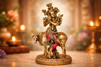 Krishna-Statue auf Kuh, multicolor, goldfarbene Ornamente, runder Sockel