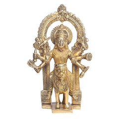 Brass Harsiddhi Maa idol with arched halo, four arms, lion figure base, front view