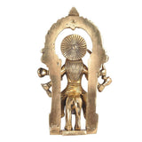 Back view of Brass Harsiddhi Maa idol with circular halo and seated figure on base