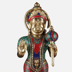 Brass Hanumanji face sculpture with crown and painted teal, red, and gold details