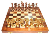 Wooden chessboard with brass Roman-style pieces on a checkered playing surface