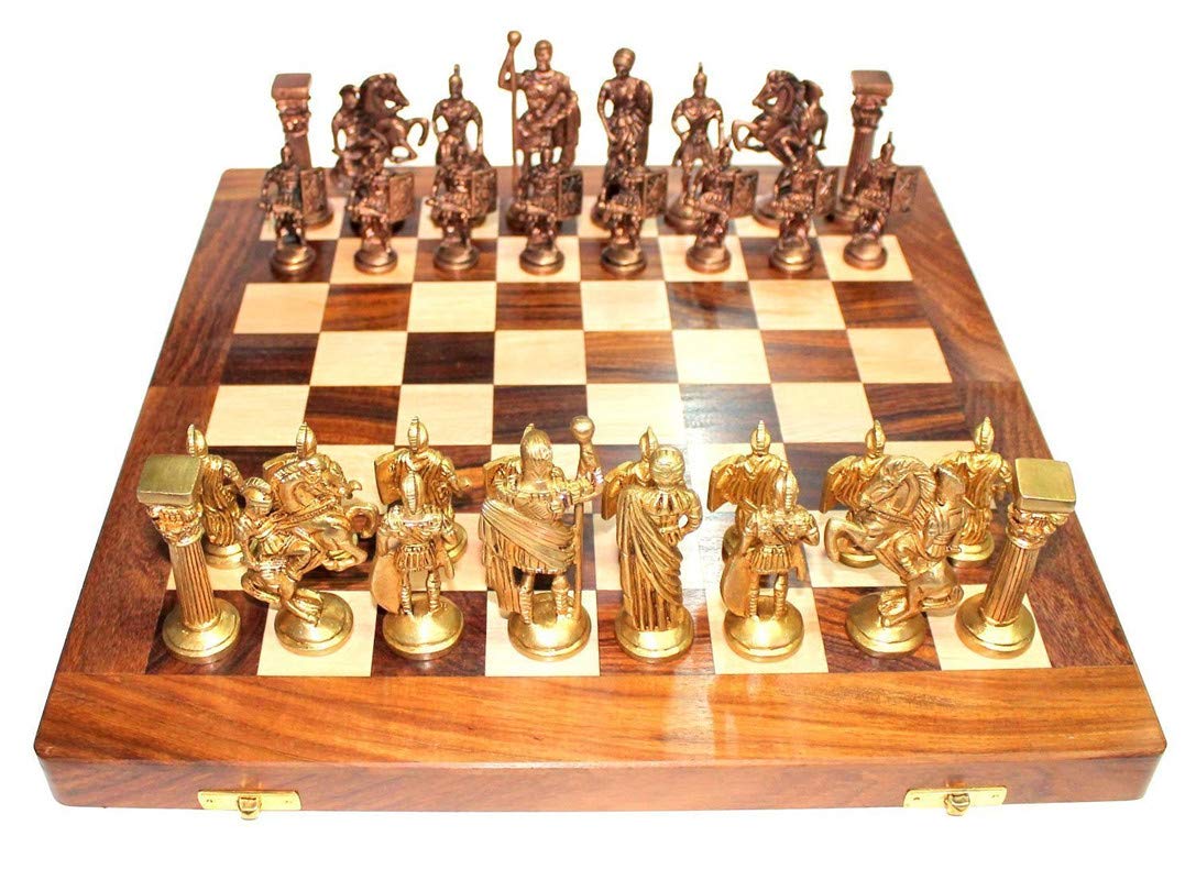 Wooden chessboard with brass Roman-style pieces on a checkered playing surface