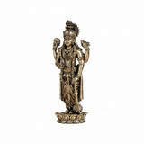 Brass standing deity idol, front view with garlands, crown, and raised arms