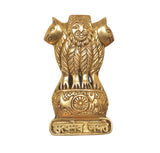 Gold-toned Ashoka stambh wall hanging with smiling face, lion arms, and wheel panel