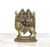AONA superfine brass Chamunda idol on lion base, two crowned faces with ornate ornaments