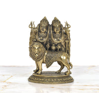 AONA superfine brass Chamunda idol on lion base, two crowned faces with ornate ornaments