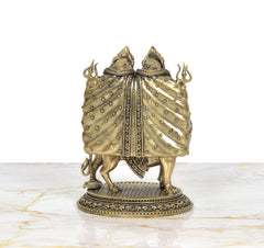 Brass Chamunda idol rear view: two crowned figures with patterned drape over their backs