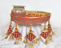 Handcrafted pooja thali plate with silver channi, red bands, gold fringe and hanging balls