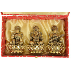 Superfine brass Lakshmi Ganesh Saraswati set in box, three seated deities on lotus bases