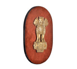 Brass Ashoka Stambh emblem wall plaque, oval wooden backing with raised lion capital