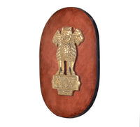 Brass Ashoka Stambh emblem on oval wooden plaque, lion figure with wheel on pedestal