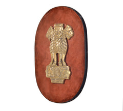 Brass Ashoka Stambh emblem on oval wooden plaque, lion figure with wheel on pedestal