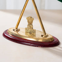 Brass round base with maroon rim and gold Ashoka emblem, two support poles