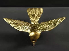 Brass eagle wall decor figurine from back, central tail and wing panels
