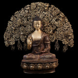 Brass seated Buddha statue with Tree of Life canopy, raised hand, circular base