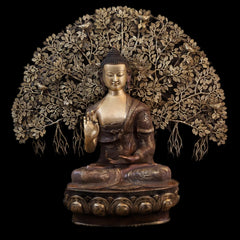 Brass seated Buddha statue with Tree of Life canopy, raised hand, circular base