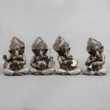 Brass musician Ganesh idol, seated with ornate crown and hands holding instruments